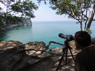A four mile hike to a cliff at Pictured Rocks National Lakeshore gives us a clear view of a peregrine nest.  This is a very productive nest; in 2014, four young peregrines fledged from this site.